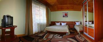 Фото номера Трехместный номер Делюкс Лоджи Zoriana г. Татаров 3