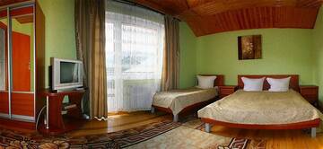 Фото номера Трехместный номер Делюкс Лоджи Zoriana г. Татаров 4