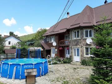Фото номера Апартаменты с 3 спальнями Апартаменты Cottage Zhelikhovskykh г. Татаров 19