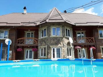 Фото номера Апартаменты с 3 спальнями Апартаменты Cottage Zhelikhovskykh г. Татаров 7
