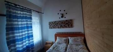 Фото номера Дом с 4 спальнями Мини-отель Готель Колиба Колорит г. Татаров 10